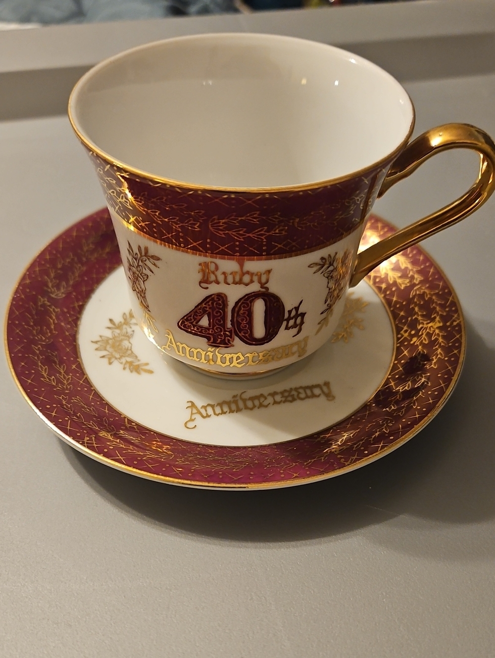 Ruby 40th Anniversary Porcelain Tea Cup & Saucer - Gold Trim